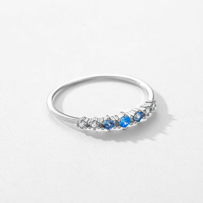 Anillo de Plata 925 con Tachuelas de Circonitas Azules